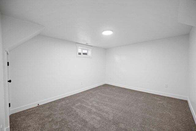 5727 N Cannon St, Spokane, WA 99205 - additional living space with dark carpet and baseboards