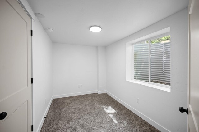 5727 N Cannon St, Spokane, WA 99205 - carpeted empty room featuring baseboards and a smoke detector