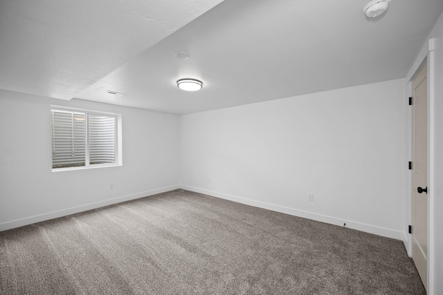 5727 N Cannon St, Spokane, WA 99205 - spare room with carpet flooring, baseboards, and a smoke detector