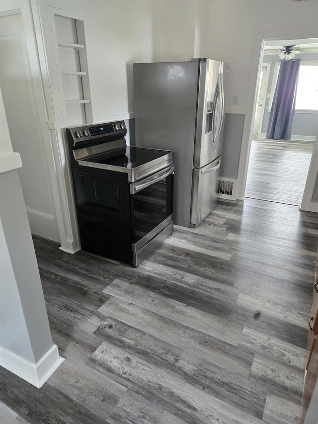 1103 E Longfellow Ave, Spokane, WA 99207 - kitchen featuring stainless steel appliances, dark wood-type flooring, and ceiling fan