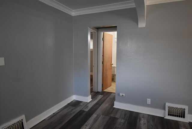 1103 E Longfellow Ave, Spokane, WA 99207 - spare room with crown molding, dark wood-style floors, and baseboards