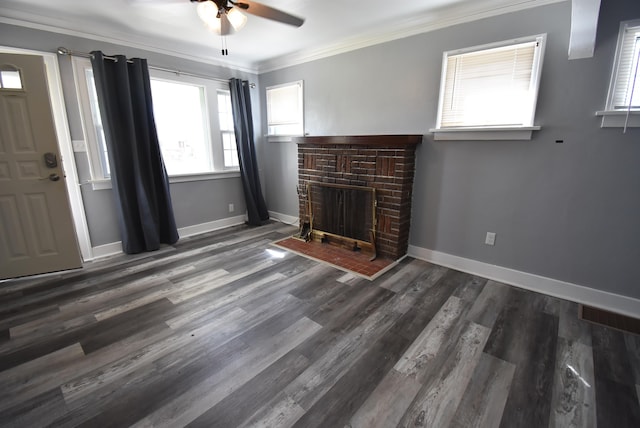 1103 E Longfellow Ave, Spokane, WA 99207 - unfurnished living room with a ceiling fan, a brick fireplace, ornamental molding, wood finished floors, and baseboards