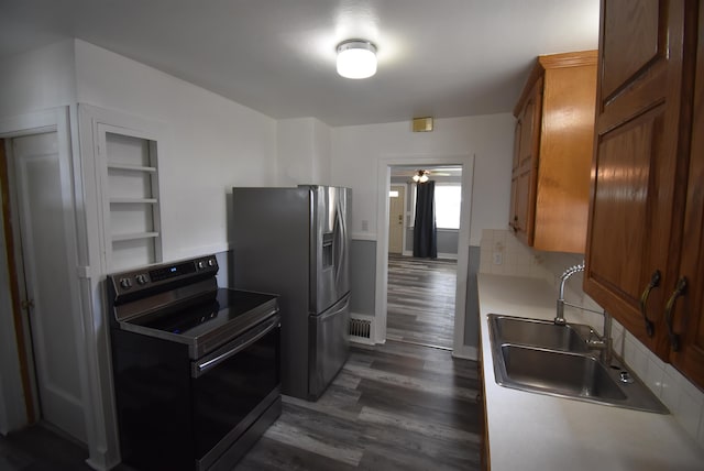1103 E Longfellow Ave, Spokane, WA 99207 - kitchen with black range with electric stovetop, a sink, dark wood-type flooring, stainless steel refrigerator with ice dispenser, and a ceiling fan