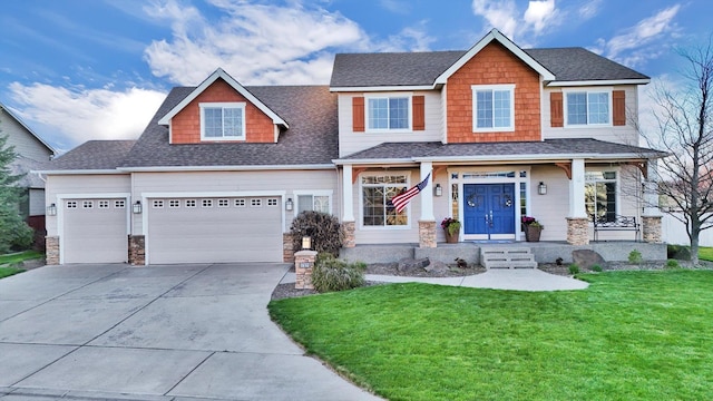 17321 E Morningside Ln, Spokane Valley, WA 99016 - craftsman inspired home with an attached garage, driveway, a front yard, stone siding, and roof with shingles