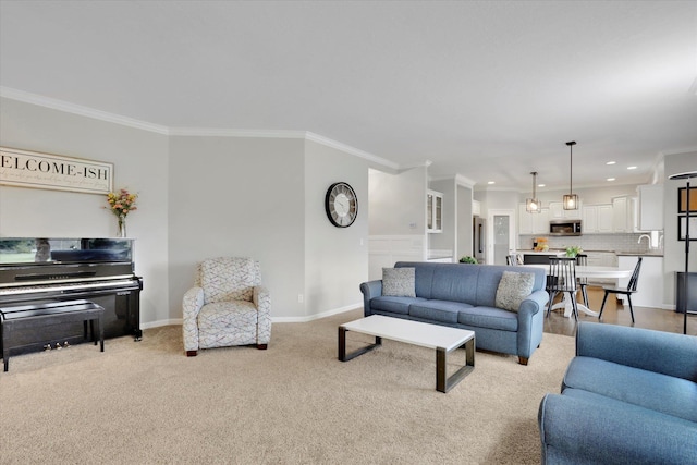 17321 E Morningside Ln, Spokane Valley, WA 99016 - living room featuring ornamental molding, recessed lighting, light colored carpet, and baseboards