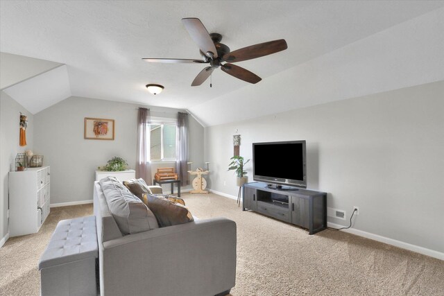 17321 E Morningside Ln, Spokane Valley, WA 99016 - living room with a ceiling fan, lofted ceiling, light carpet, and baseboards