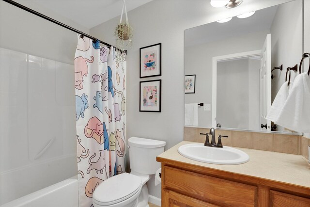 17321 E Morningside Ln, Spokane Valley, WA 99016 - full bathroom with toilet, vanity, and shower / bath combination with curtain