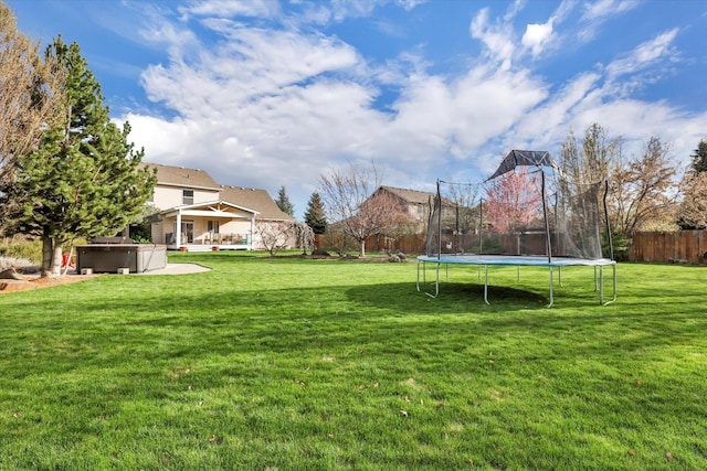 17321 E Morningside Ln, Spokane Valley, WA 99016 - view of yard featuring a trampoline and a hot tub