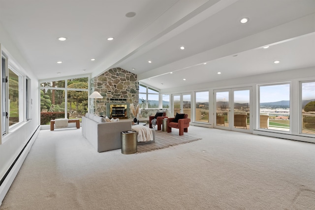 17500 E Wellesley Ave, Spokane Valley, WA 99216 - living area with a baseboard radiator, carpet floors, a stone fireplace, baseboard heating, and recessed lighting