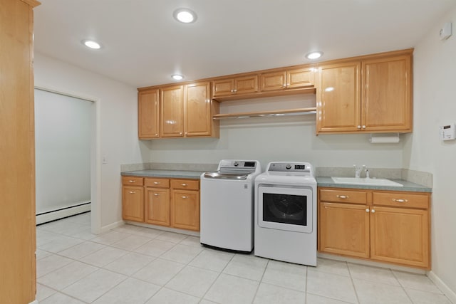 17500 E Wellesley Ave, Spokane Valley, WA 99216 - laundry room with a baseboard radiator, washer and clothes dryer, recessed lighting, light tile patterned floors, and cabinet space