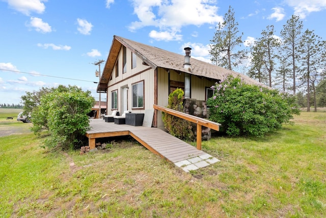 6500 W Soledad Ln, Cheney, WA 99004 - back of property with a wooden deck and a yard