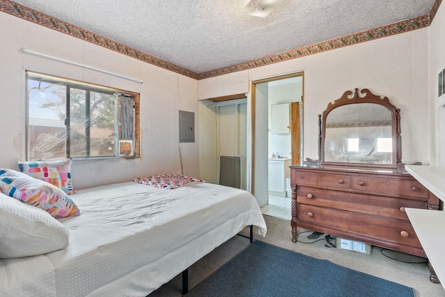 6500 W Soledad Ln, Cheney, WA 99004 - bedroom with carpet floors, a textured ceiling, and electric panel