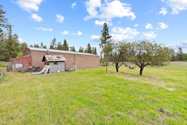 6500 W Soledad Ln, Cheney, WA 99004 - view of green lawn featuring an outbuilding and an outdoor structure