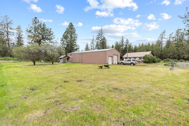 6500 W Soledad Ln, Cheney, WA 99004 - view of grassy yard with a garage and an outbuilding