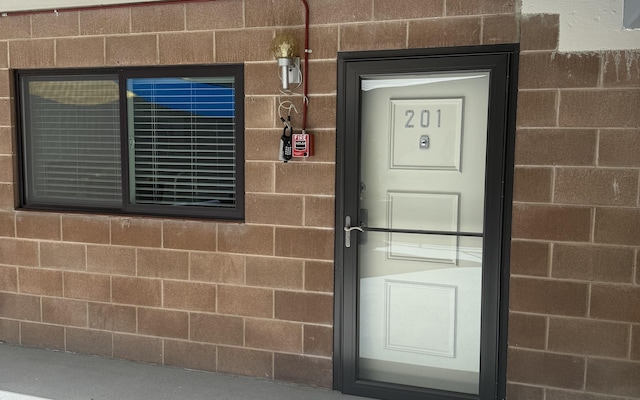 136 E Rockwood Blvd Unit 201, Spokane, WA 99202 - property entrance featuring concrete block siding