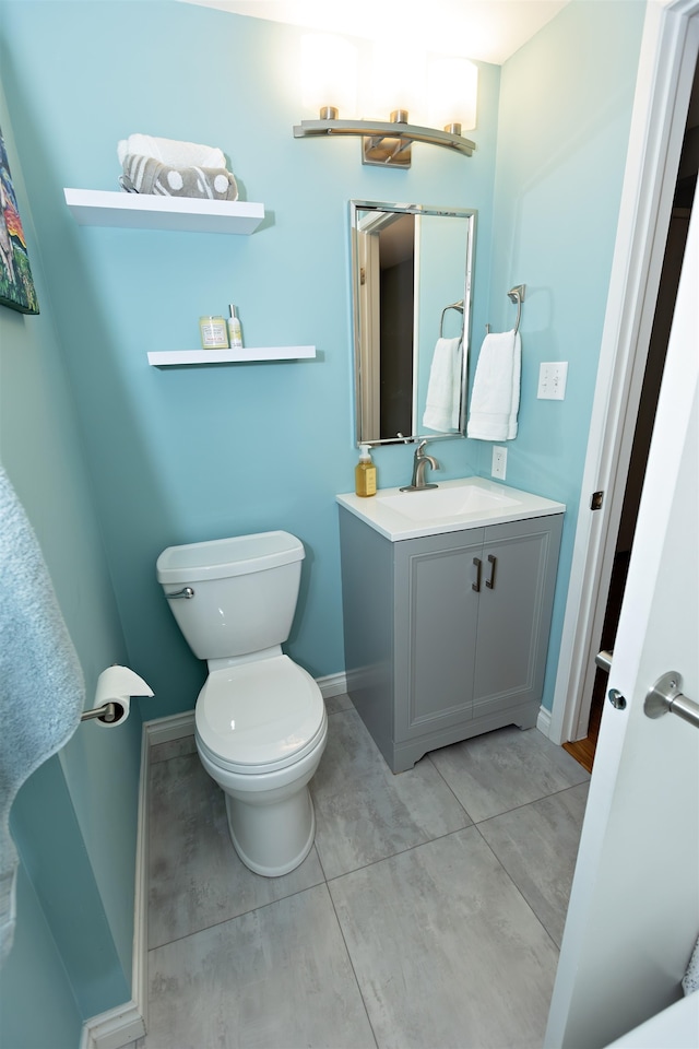 136 E Rockwood Blvd Unit 201, Spokane, WA 99202 - bathroom featuring vanity, toilet, and baseboards