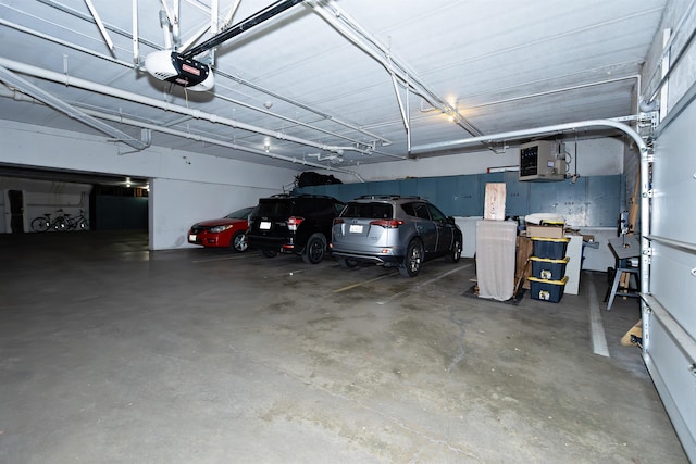 136 E Rockwood Blvd Unit 201, Spokane, WA 99202 - parking garage with a garage door opener and a heating unit