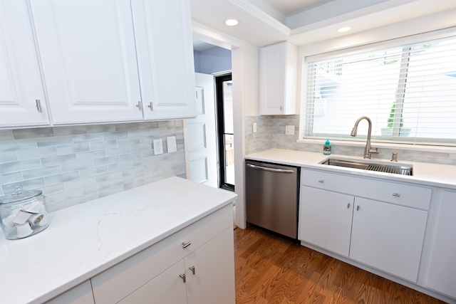 136 E Rockwood Blvd Unit 201, Spokane, WA 99202 - kitchen featuring dishwasher, a sink, tasteful backsplash, dark wood finished floors, and white cabinets
