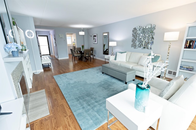 136 E Rockwood Blvd Unit 201, Spokane, WA 99202 - living area featuring wood finished floors and baseboards