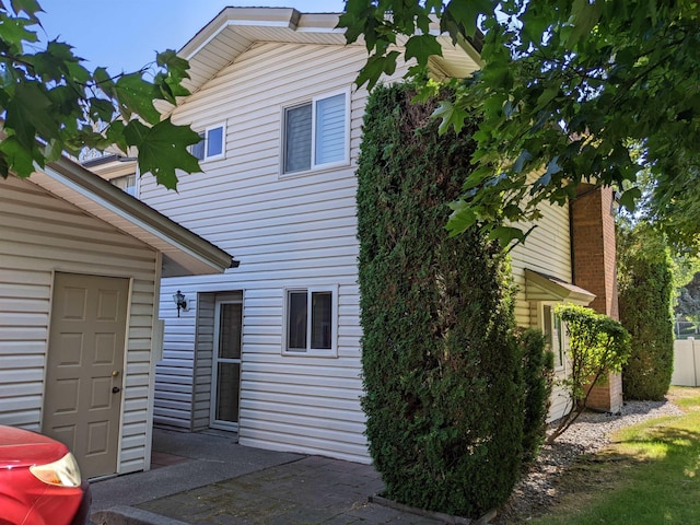 7878 N Wilding Dr Unit 14, Spokane, WA 99208 - rear view of house featuring a patio area