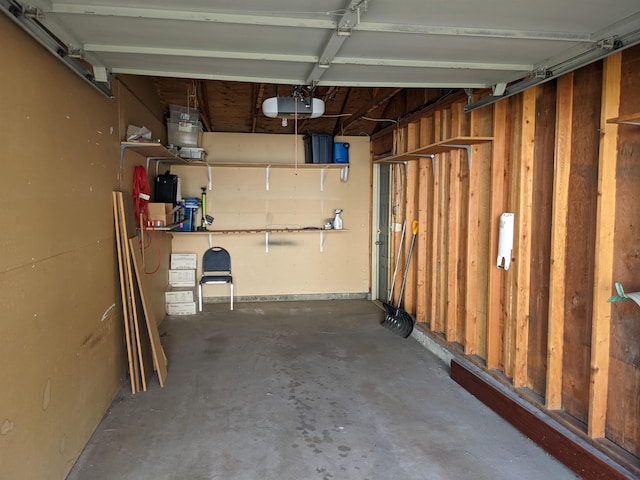 7878 N Wilding Dr Unit 14, Spokane, WA 99208 - garage featuring a garage door opener