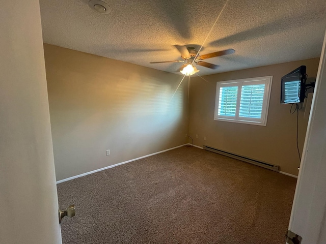 7878 N Wilding Dr Unit 14, Spokane, WA 99208 - carpeted empty room featuring baseboard heating, ceiling fan, a textured ceiling, and baseboards