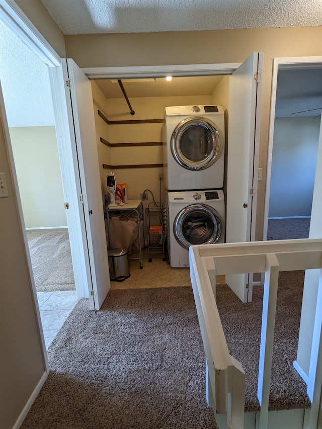 7878 N Wilding Dr Unit 14, Spokane, WA 99208 - laundry area with estacked washer and dryer and carpet floors