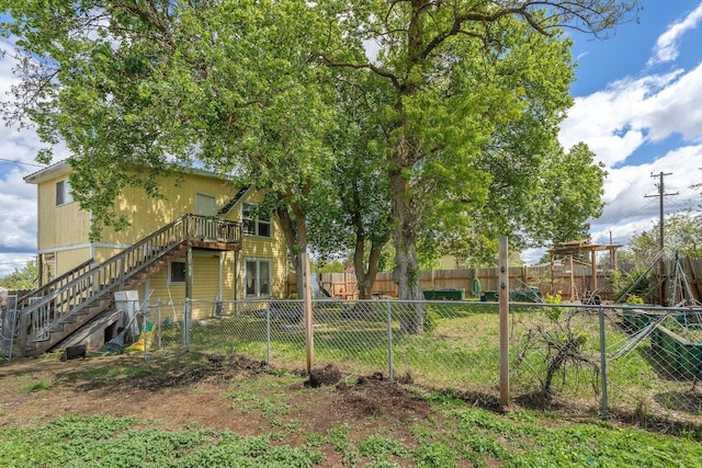 802 10th St, Davenport, WA 99122 - fenced backyard featuring stairway and a wooden deck
