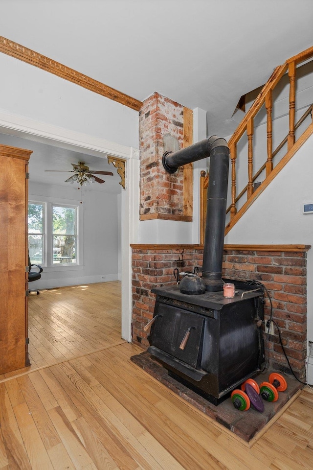 802 10th St, Davenport, WA 99122 - detailed view of a wood stove, wood finished floors, and ceiling fan