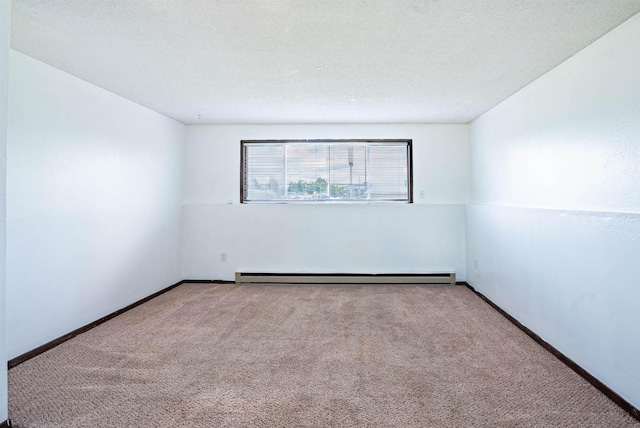 16108 E Broadway Avenue 16110E Broadway Ave, Spokane Valley, WA 99037 - carpeted empty room with baseboard heating, baseboards, and a textured ceiling