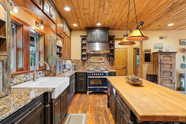 3475B Waitts Lake Rd, Valley, WA 99181 - kitchen with butcher block countertops, open shelves, range with two ovens, wooden ceiling, and dark wood-style floors