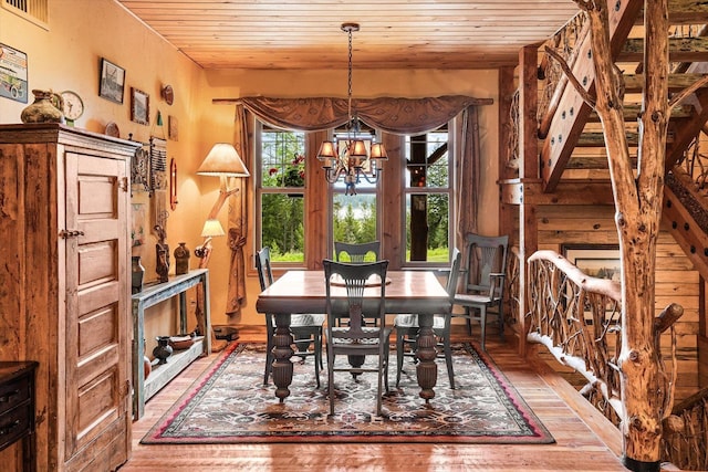 3475B Waitts Lake Rd, Valley, WA 99181 - dining room with light wood finished floors, wooden ceiling, and a chandelier
