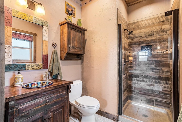 3475B Waitts Lake Rd, Valley, WA 99181 - bathroom with toilet, a shower stall, vanity, and a textured wall