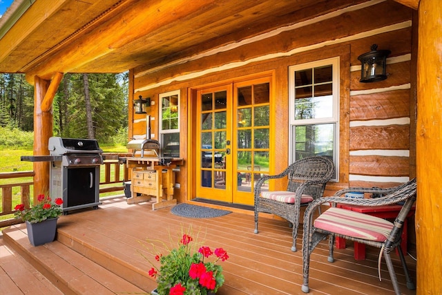 3475B Waitts Lake Rd, Valley, WA 99181 - wooden deck with french doors and a grill
