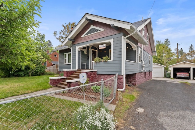 1116 E Newark Ave, Spokane, WA 99202 - view of front of house featuring an outdoor structure and a garage