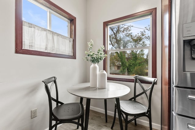 1116 E Newark Ave, Spokane, WA 99202 - dining area featuring baseboards and wood finished floors