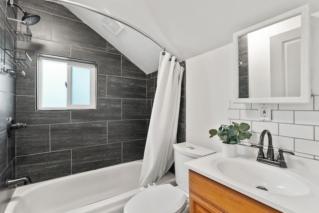 1116 E Newark Ave, Spokane, WA 99202 - full bathroom with shower / bath combo with shower curtain, toilet, vanity, decorative backsplash, and lofted ceiling