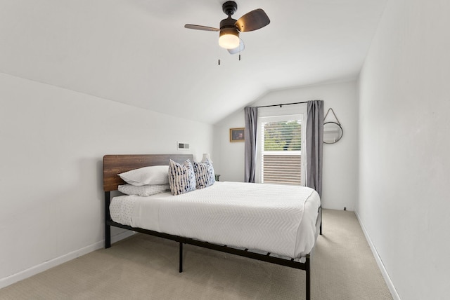 1116 E Newark Ave, Spokane, WA 99202 - bedroom with vaulted ceiling, light colored carpet, a ceiling fan, and baseboards