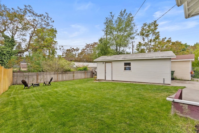 1116 E Newark Ave, Spokane, WA 99202 - view of yard with an outdoor fire pit and an outbuilding