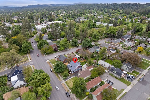 1116 E Newark Ave, Spokane, WA 99202 - aerial view of property and surrounding area featuring a forest and nearby suburban area