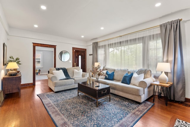 1116 E Newark Ave, Spokane, WA 99202 - living room featuring wood finished floors, baseboards, and recessed lighting