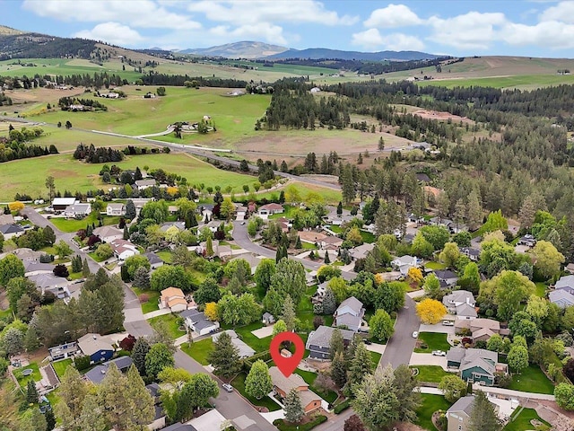 11723 S Player Dr, Spokane, WA 99223 - aerial view of residential area with a mountainous background