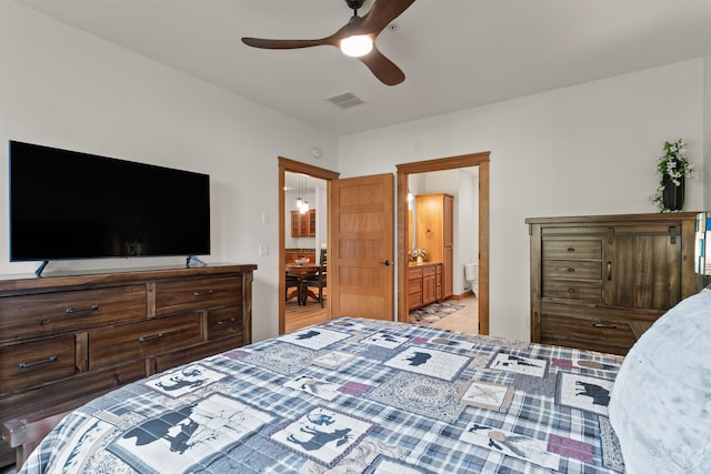 4461 W Greenchain Loop # 5, Coeur D Alene, ID 83814 - bedroom with ensuite bath and a ceiling fan