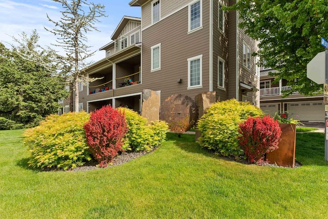 4461 W Greenchain Loop # 5, Coeur D Alene, ID 83814 - view of property exterior with a lawn