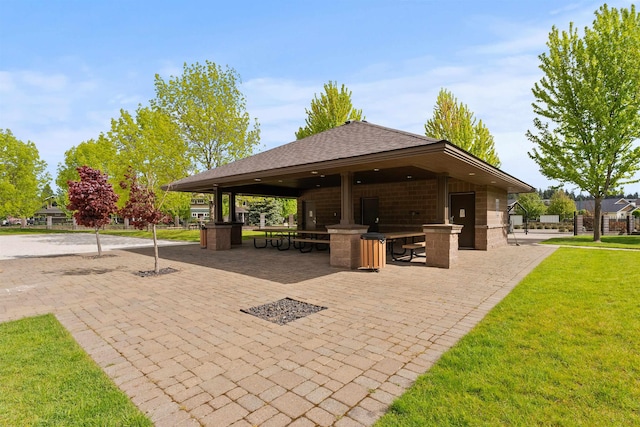 4461 W Greenchain Loop # 5, Coeur D Alene, ID 83814 - surrounding community featuring a lawn and a patio