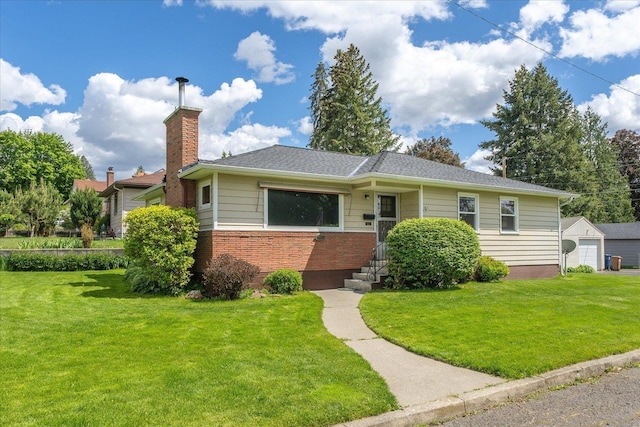 4218 N E St, Spokane, WA 99205 - view of front of property featuring a front yard, brick siding, and a chimney