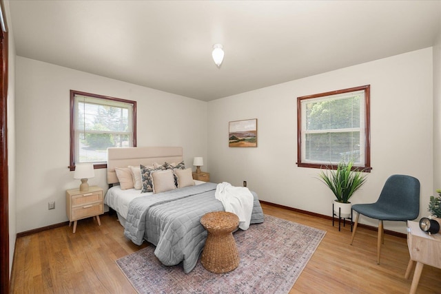 4218 N E St, Spokane, WA 99205 - bedroom featuring light wood-type flooring and baseboards