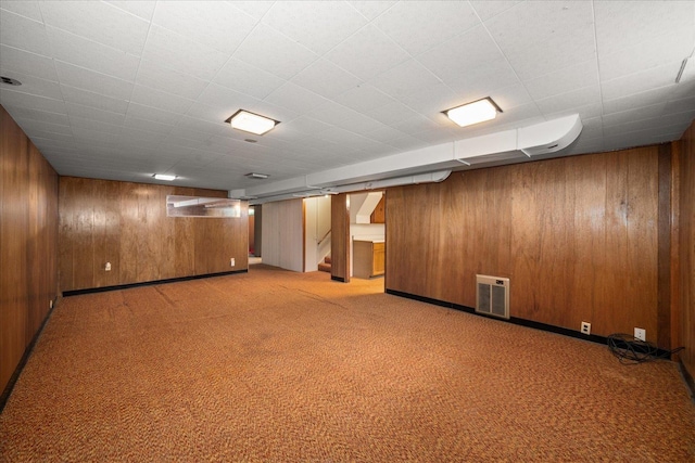 4218 N E St, Spokane, WA 99205 - finished below grade area with wooden walls, carpet, and stairway