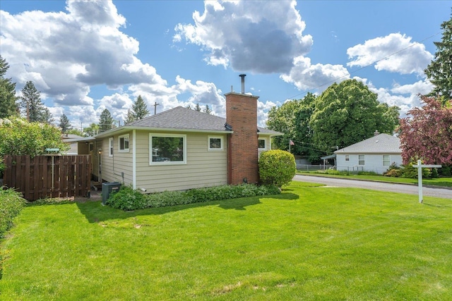 4218 N E St, Spokane, WA 99205 - view of home's exterior with a chimney