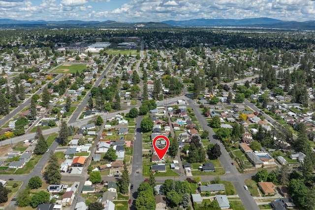 4218 N E St, Spokane, WA 99205 - aerial overview of property's location with mountains